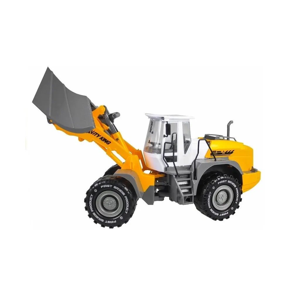 Duży spychacz zabawkowy z ruchomymi elementami podczas zabawy