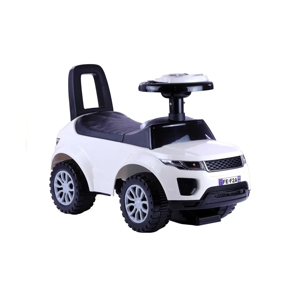 Jeździk dla malucha 613W biały z interaktywną kierownicą i światłami