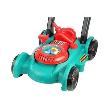 Zabawkowa kosiarka z kolorowymi kuleczkami podczas jazdy