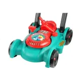 Zabawkowa kosiarka z kolorowymi kuleczkami podczas jazdy