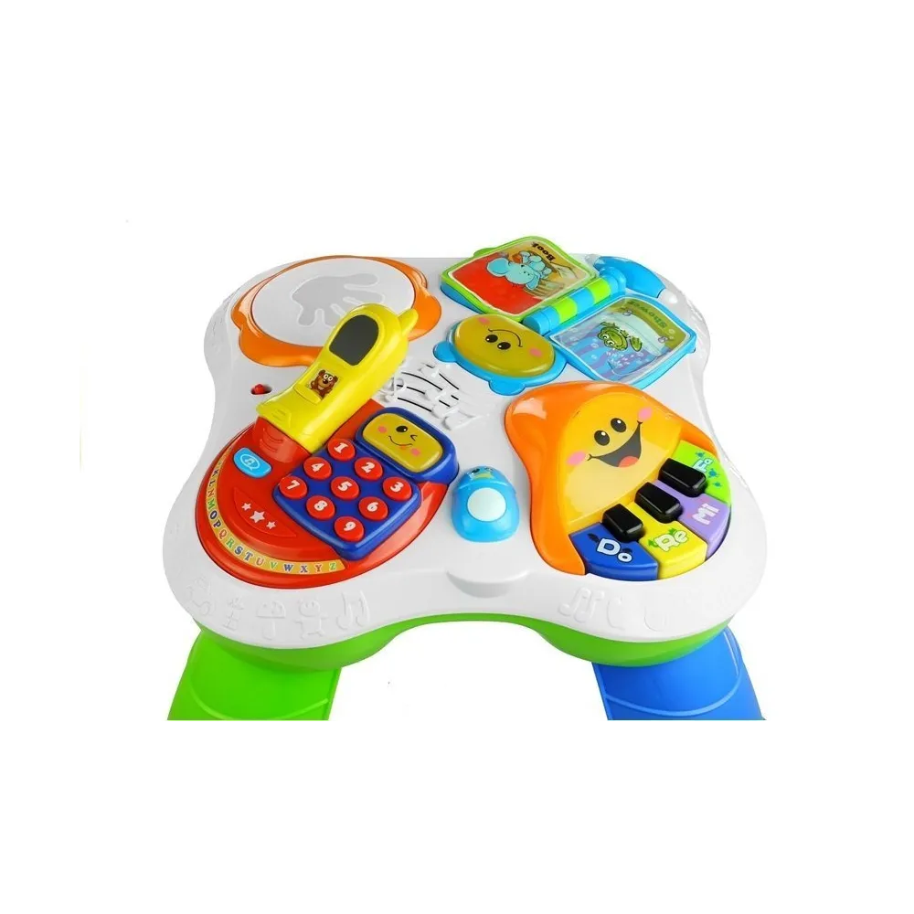 pianinko dziecięce edukacyjne na kolorowym stoliku