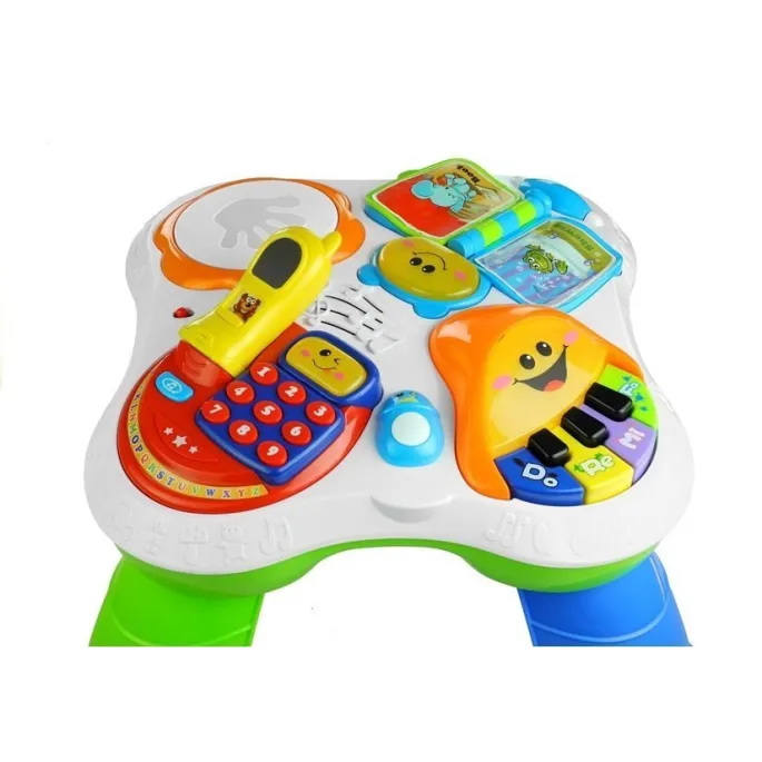 pianinko dziecięce edukacyjne na kolorowym stoliku