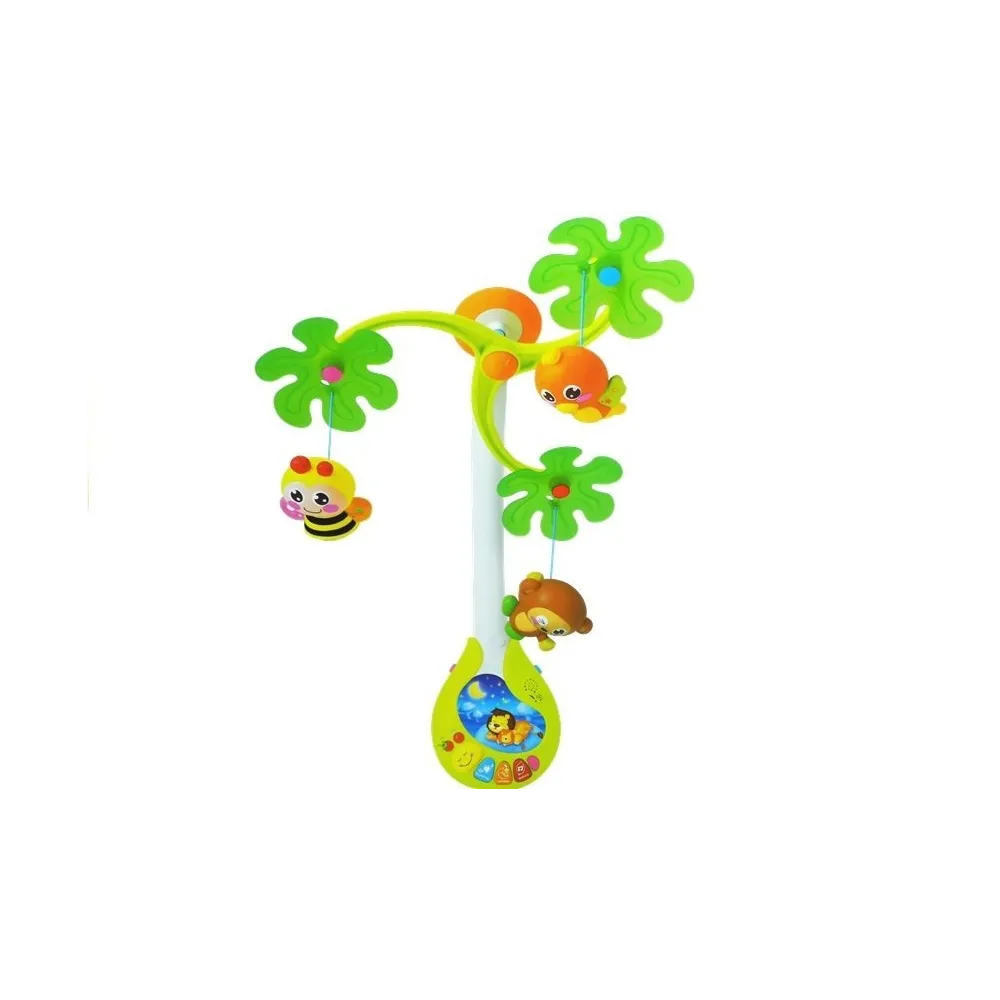 Karuzela pozytywka z zabawkami grzechotkami zawieszona nad łóżeczkiem