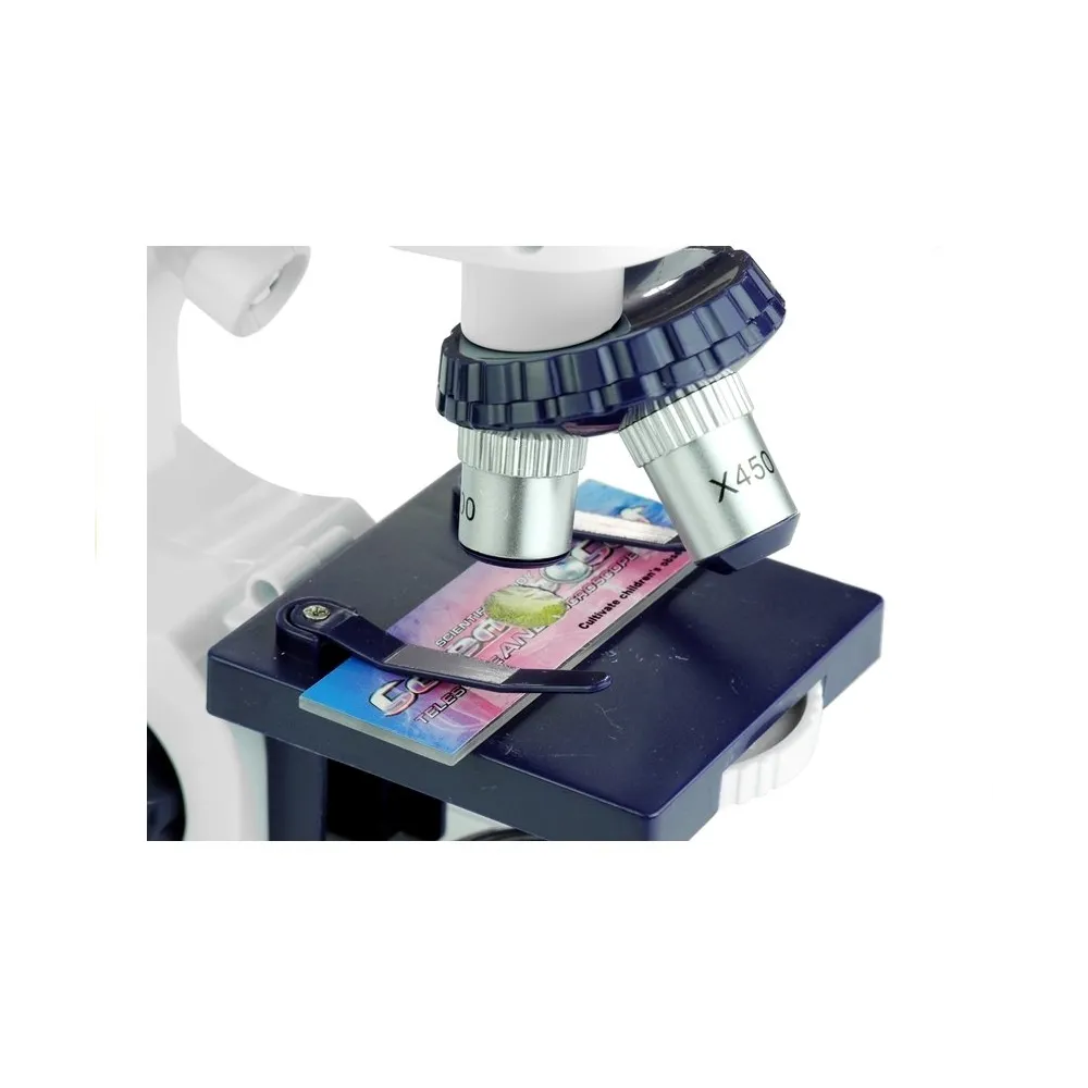 Detal obrotowego dysku z kolorowymi filtrami w mikroskopie dla dzieci