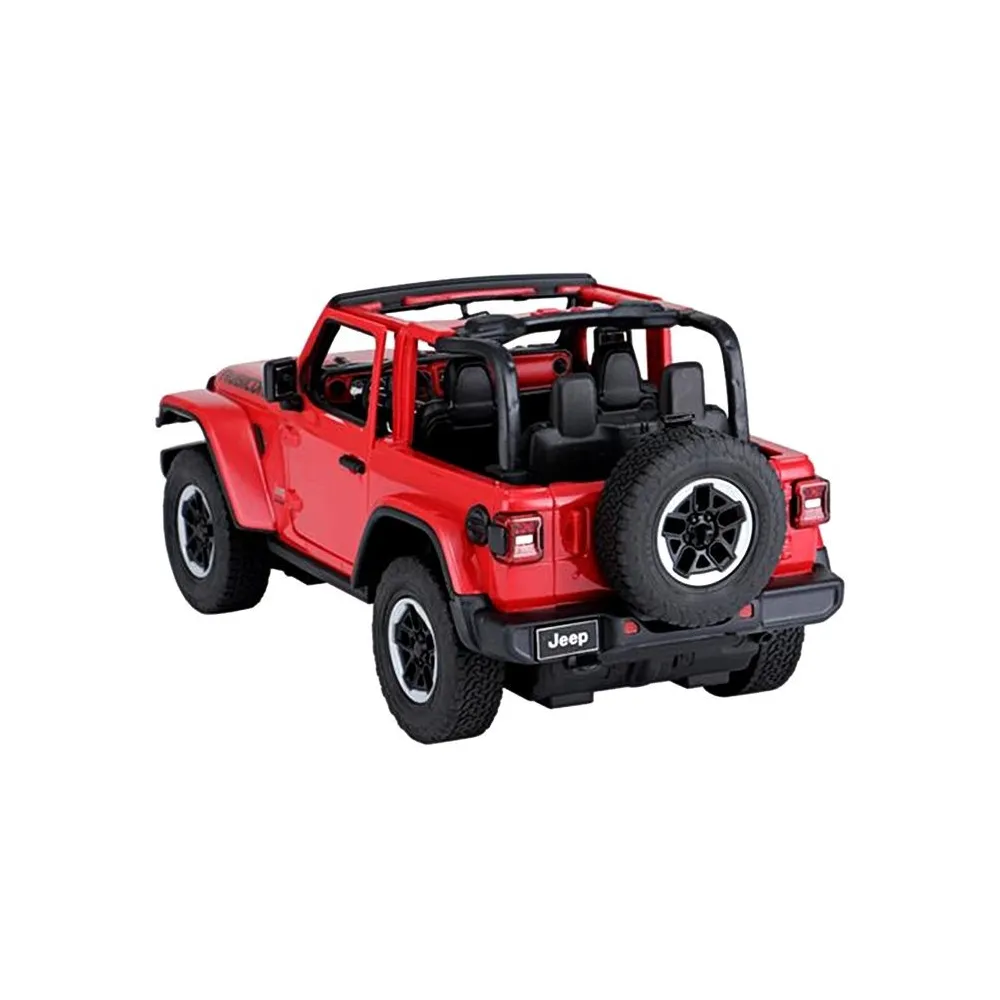 Auto R/C Jeep Wrangler Rubicon z boku na tle terenu