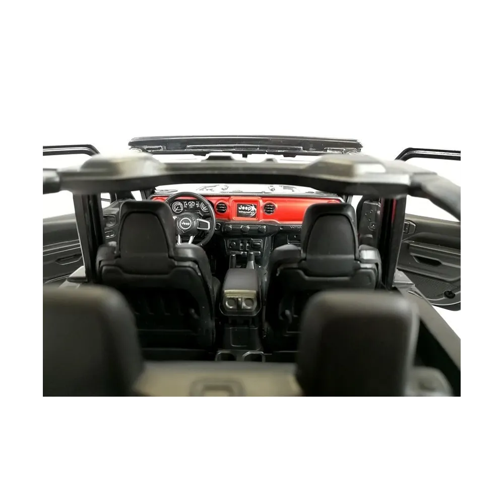 Zbliżenie na światła LED Jeep Wrangler Rubicon R/C 1:14 podczas jazdy