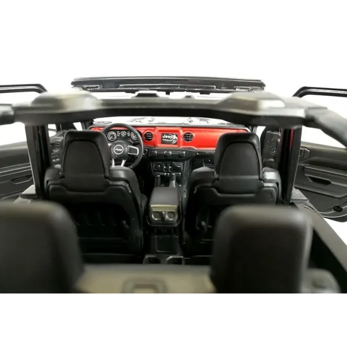 Zbliżenie na światła LED Jeep Wrangler Rubicon R/C 1:14 podczas jazdy