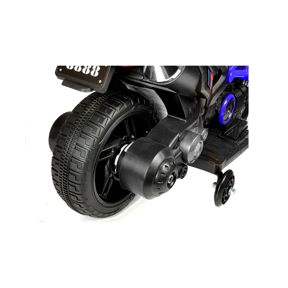 Motocykl na akumulator GTM1188 niebieski w ogrodzie