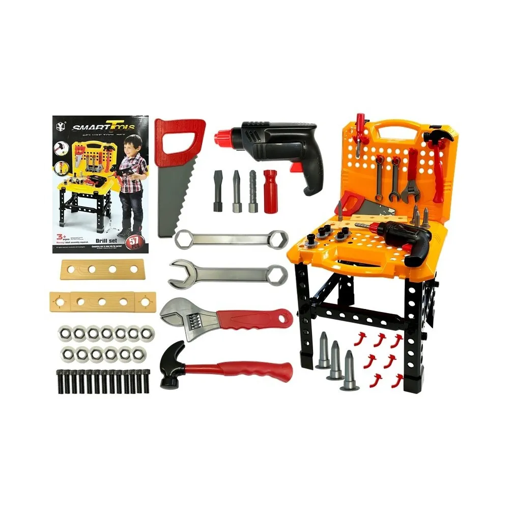 Duży zestaw majsterkowicza rozłożony na podłodze z narzędziami dla dzieci
