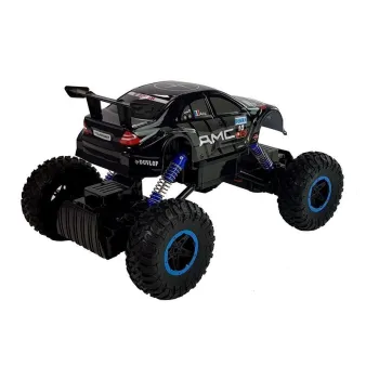 Monster truck RC z dużymi gumowymi kołami i amortyzatorami