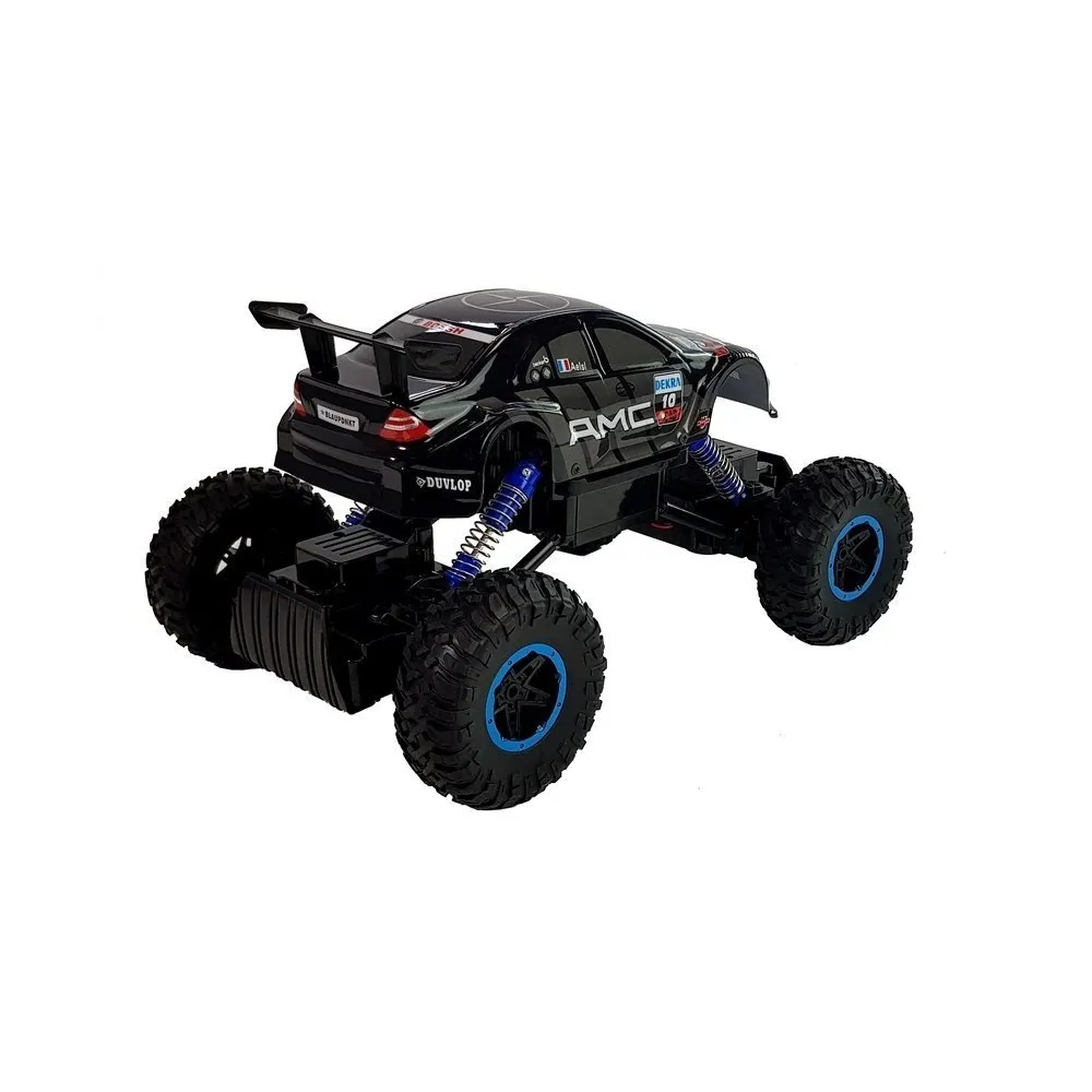 Monster truck RC z dużymi gumowymi kołami i amortyzatorami