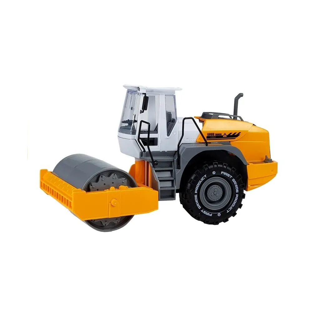 Jasnopomarańczowy walec budowlany z widocznymi bieżnikowanymi kołami