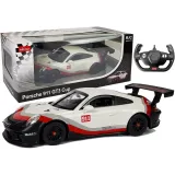 Białe auto R/C Porsche 911 GT3 CUP 1:14 w dynamicznej pozie na tle asfaltu