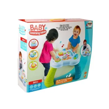 Edukacyjny stolik z ozdobnym tortem i bezpiecznymi materiałami