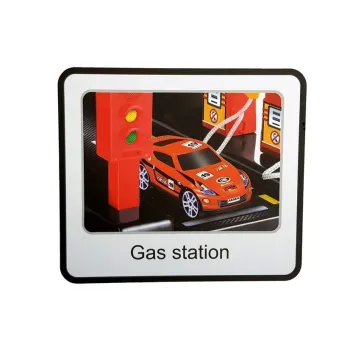 Dziecko bawiące się garażem parkingowym z windą i światłami