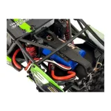 Auto RC FY-03 na trawie demonstruje zawieszenie i amortyzację