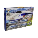 Lokomotywa Pendolino z wagonami, drzewkami i znakami