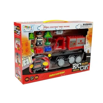 Sterowanie zdalnym kontrolerem w zabawkowym wozie strażackim