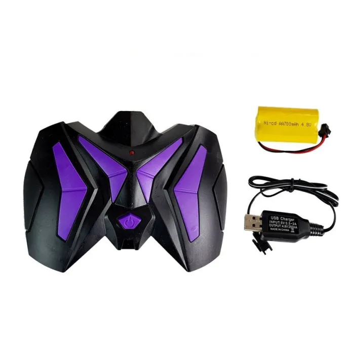 Zestaw: dinozaur RC Tyranozaur, pilot i akumulator na tle pudełka