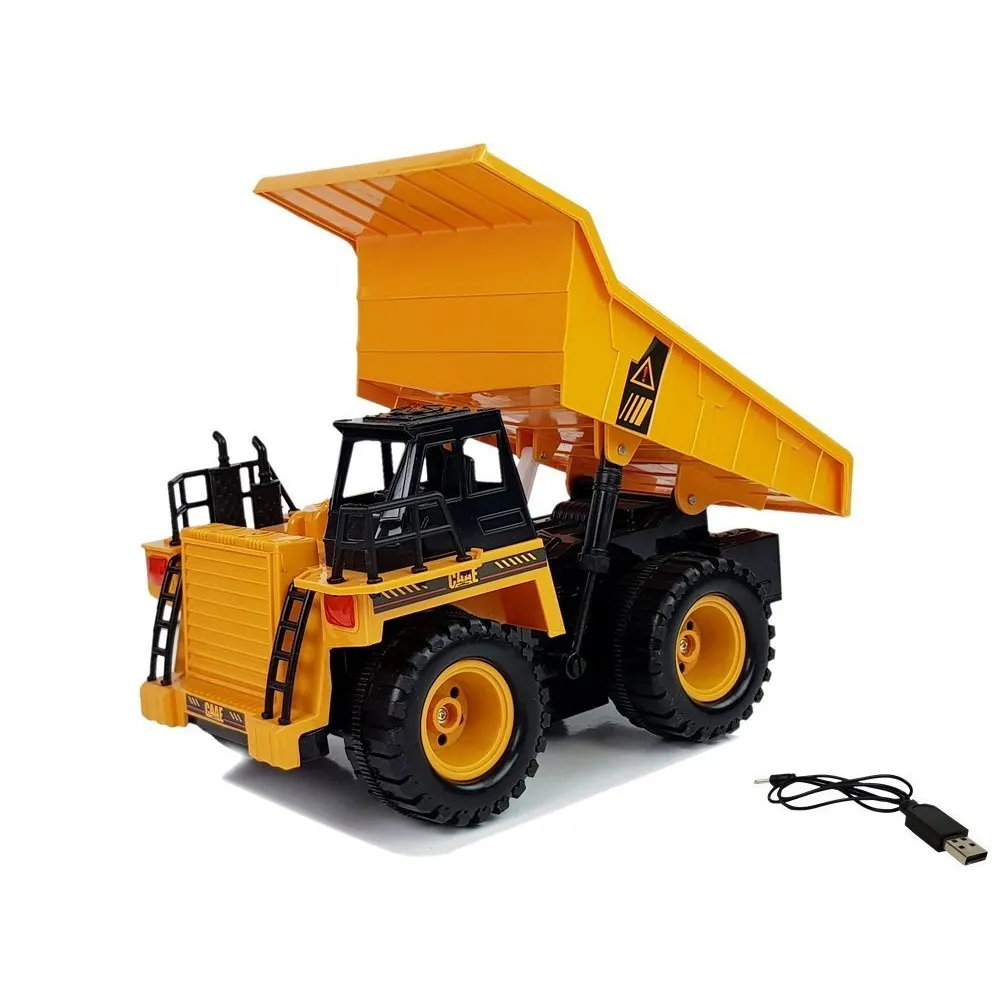 Sterowana gestem ręki wywrotka na tle opaski na nadgarstek