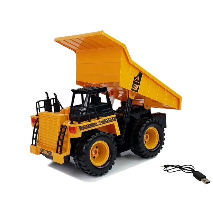 Sterowana gestem ręki wywrotka na tle opaski na nadgarstek