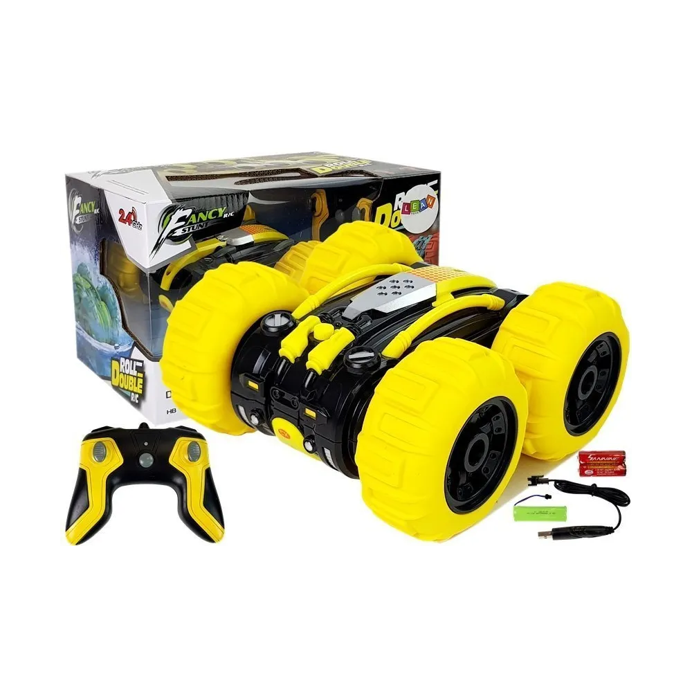 Żółta amfibia zdalnie sterowana podczas jazdy po trawie