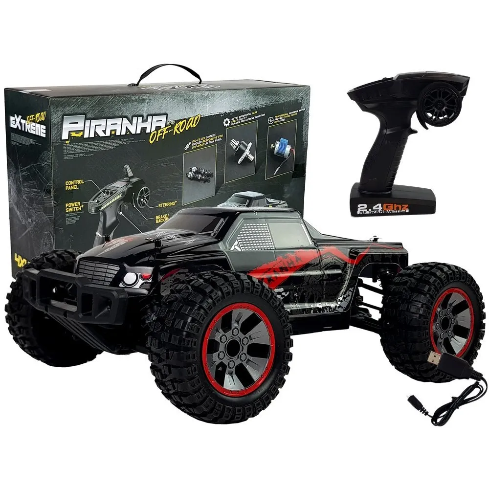 Czerwone auto terenowe RC off-road w skali 1:10 na trawie