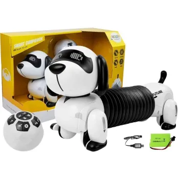 Interaktywny pies robot z pilotem w kształcie piłki na białym tle