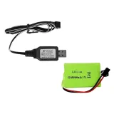 Akcesoria zestawu: pies robot, pilot, kabel i instrukcja obsługi