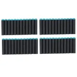 Trzy połówki puszek jako cele treningowe do pistoletu na piankowe naboje