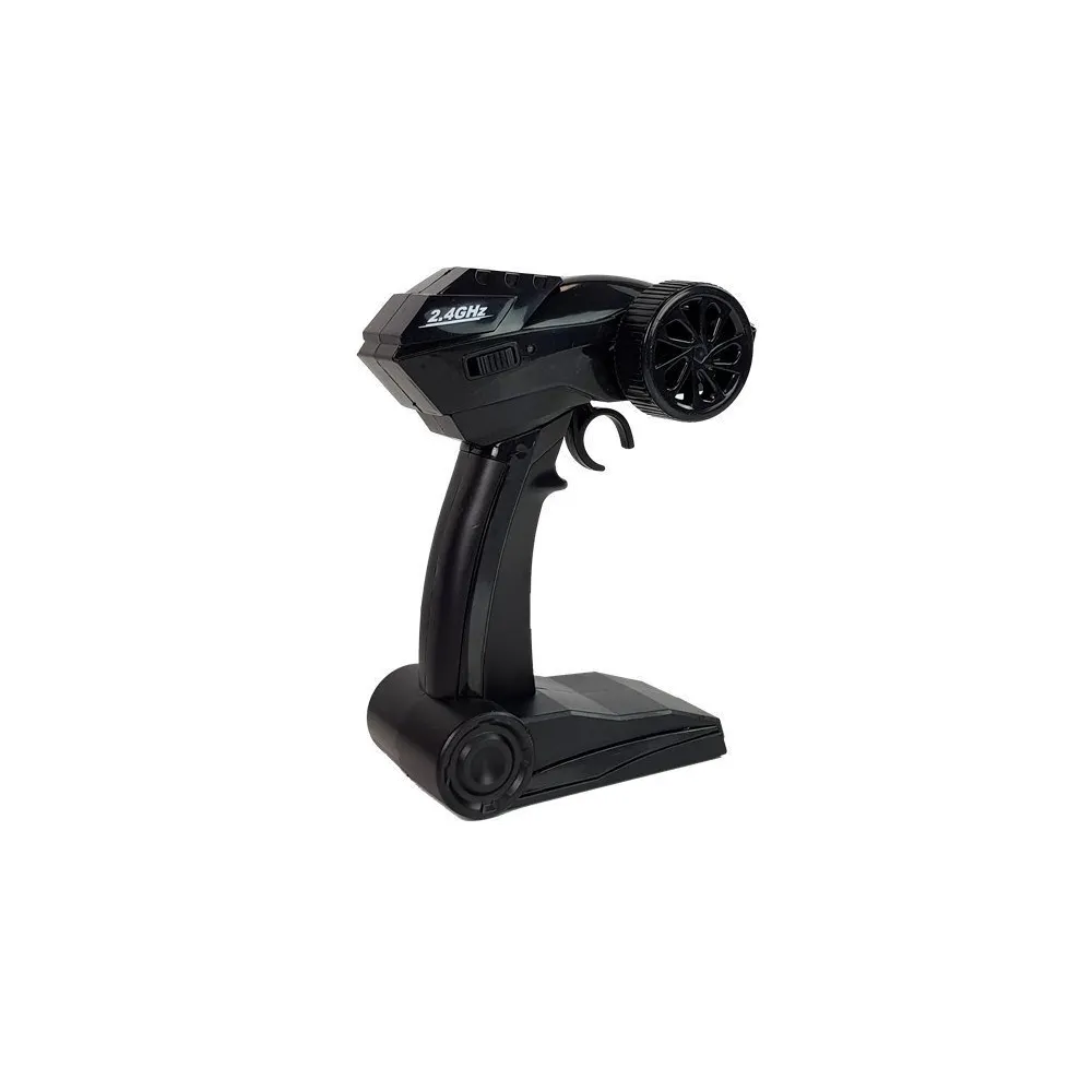 Biało-czarny samochód terenowy RC 2.4G podczas jazdy po kamieniach