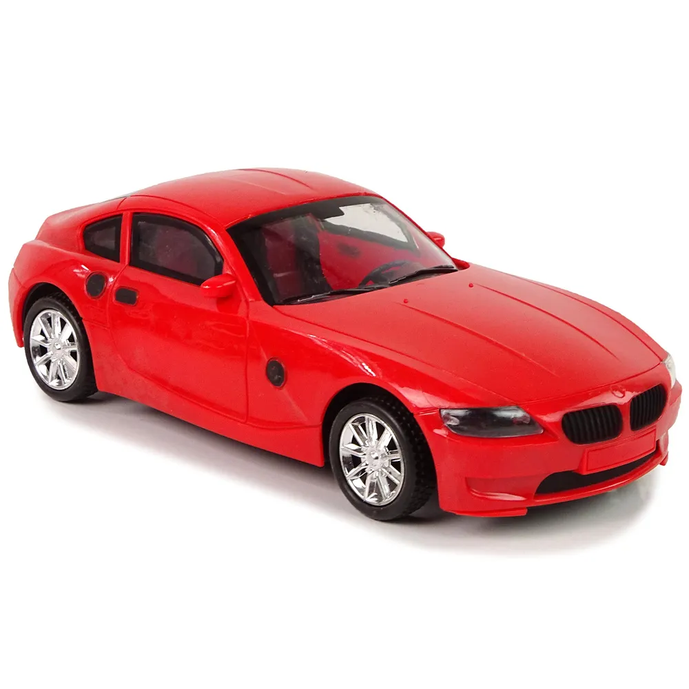 Białe BMW w detalach na lawecie, zabawkowy samochód dla dzieci