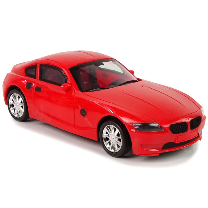 Białe BMW w detalach na lawecie, zabawkowy samochód dla dzieci