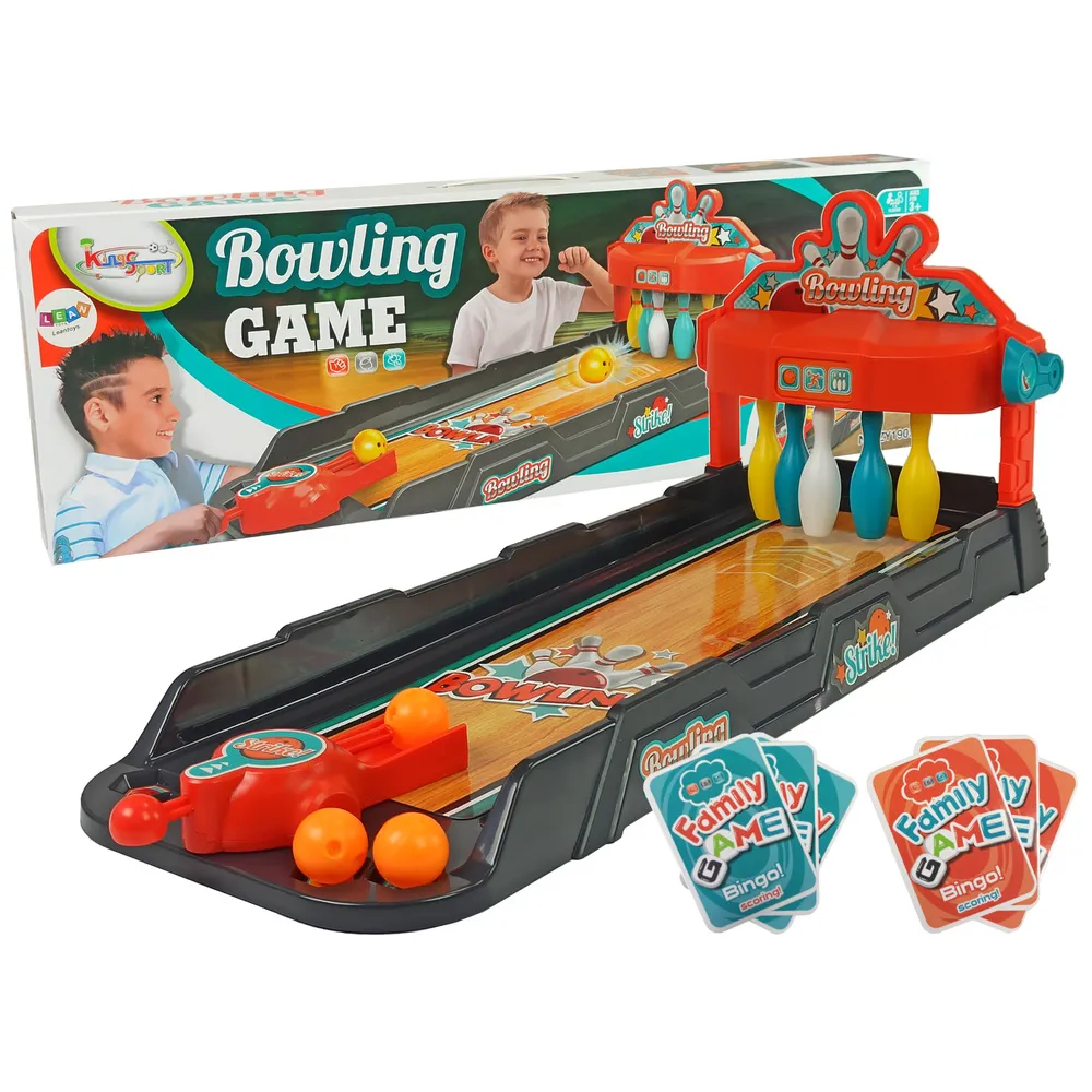 Mini gra w kręgle z wyrzutnią i kolorowymi piłkami na stole