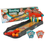 Mini gra w kręgle z wyrzutnią i kolorowymi piłkami na stole