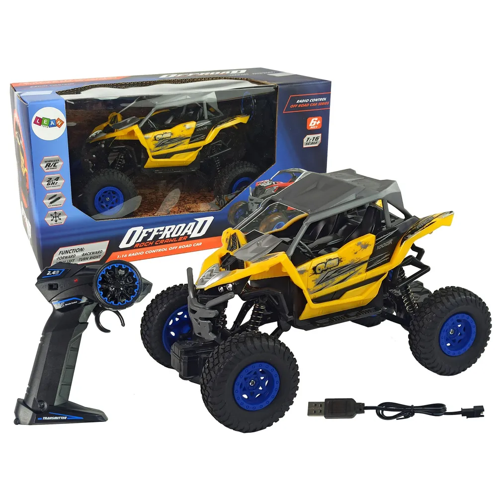Terenowe auto off-road RC żółte w skali 1:16 na tle trawy