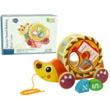 Drewniany jeż do ciągnięcia na kółkach z sorterem i klockami geometrycznymi