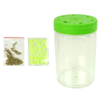 Słoik dekoracyjny z dinozaurami i światłem LED na biurku dziecka