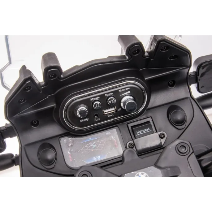 Dziecięcy motocykl na akumulator z efektownymi detalami policyjnymi