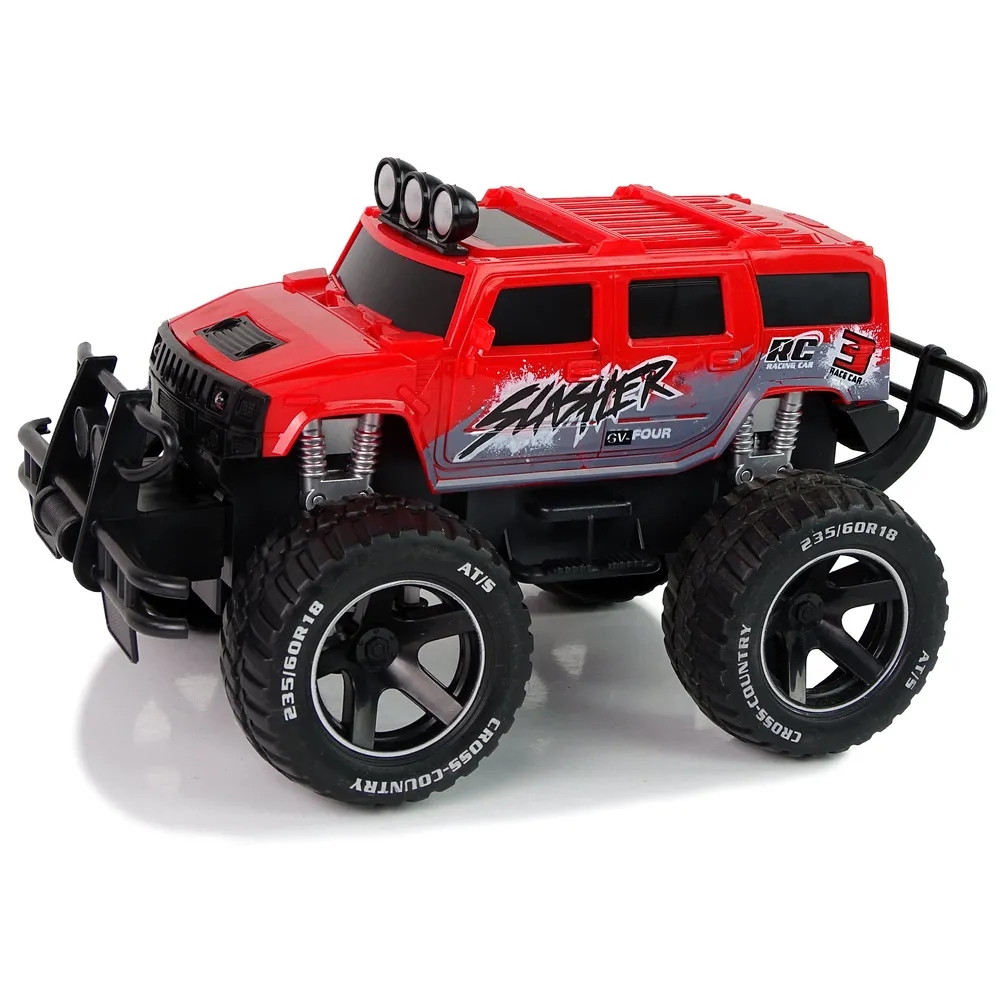 Model samochodu RC Cross-Country w skali 1:14 jadący po kamieniach