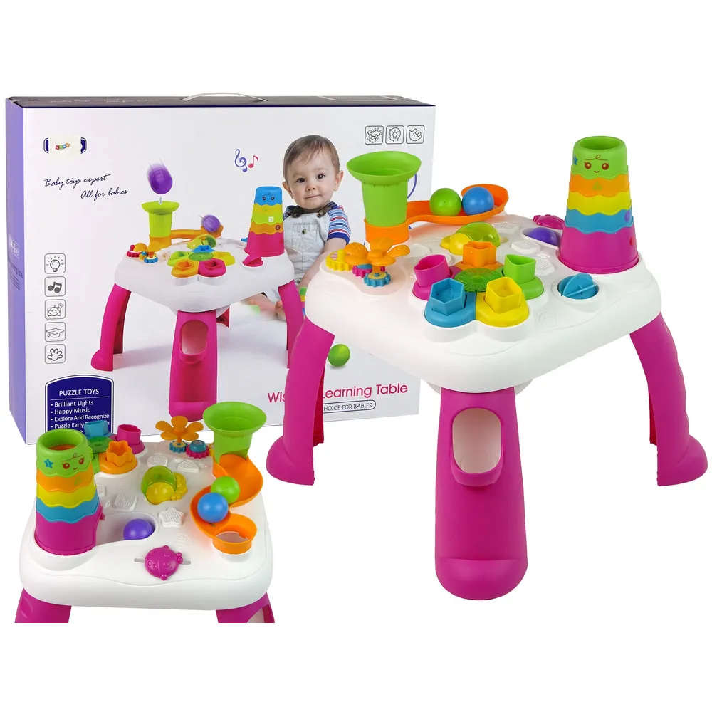 Różowy interaktywny stolik edukacyjny z sorterem kształtów i zjeżdżalnią piłeczek