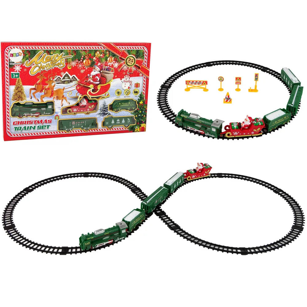 Świąteczna kolejka z lokomotywą i saniami Mikołaja na długim torze