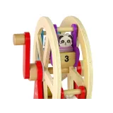 Kolorowe figurki zwierząt umieszczone na drewnianym diabelskim młynie