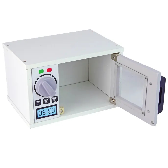 Biała mikrofalówka dziecięca z akcesoriami jak donuty i frytki