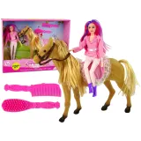 Lalka jeździec razem z brązowym kucykiem podczas zabawy