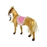 Jeździecka lalka stojąca obok konika na zabawkowej łące