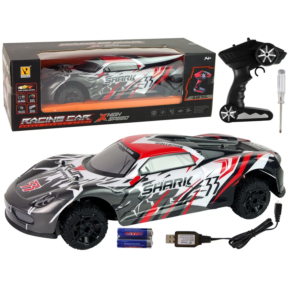 Szaro-białe auto sportowe RC w skali 1:8 na białym tle