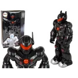 Czarny robot interaktywny dla dzieci chodzący z efektami świetlnymi