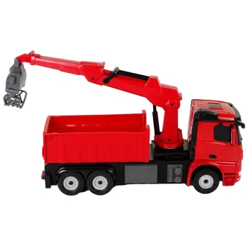 Pilot do ciężarówki Mercedes Rastar leżący obok pojazdu