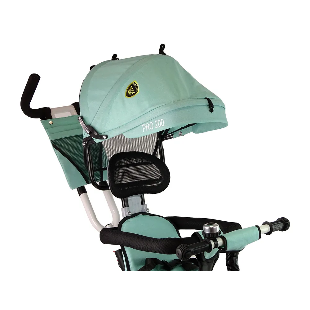 Demontowana obręcz ochronna i pasy bezpieczeństwa w rowerku PRO200 Miętowym